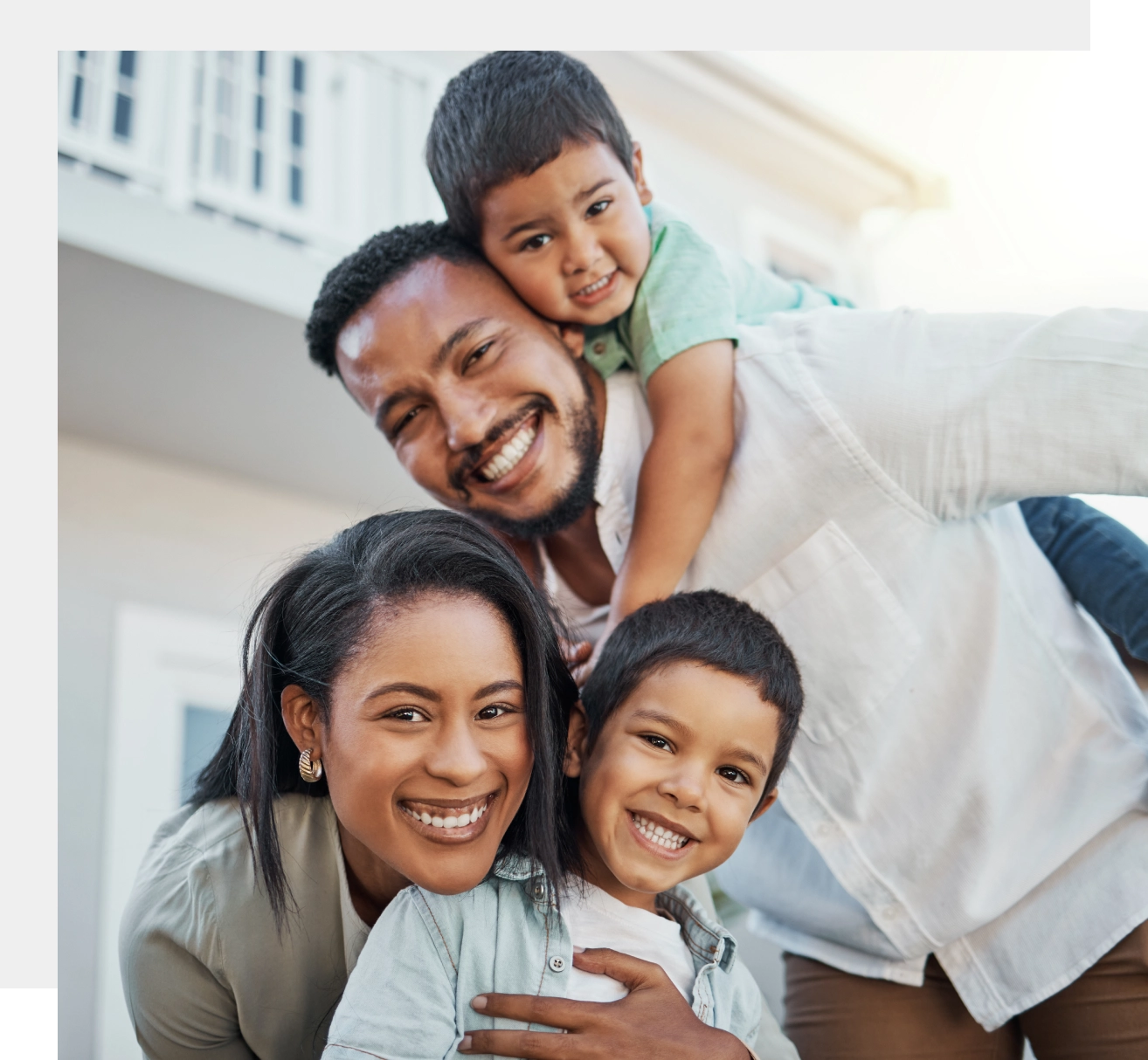 Happy family with two smiling children.